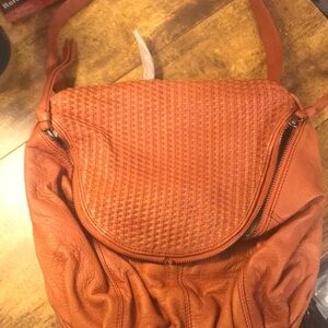 Christopher.Kon soft brown leather purse with weaved top flap cloth interior